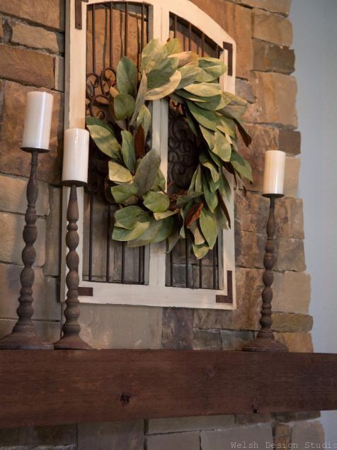 magnolia wreath over fireplace