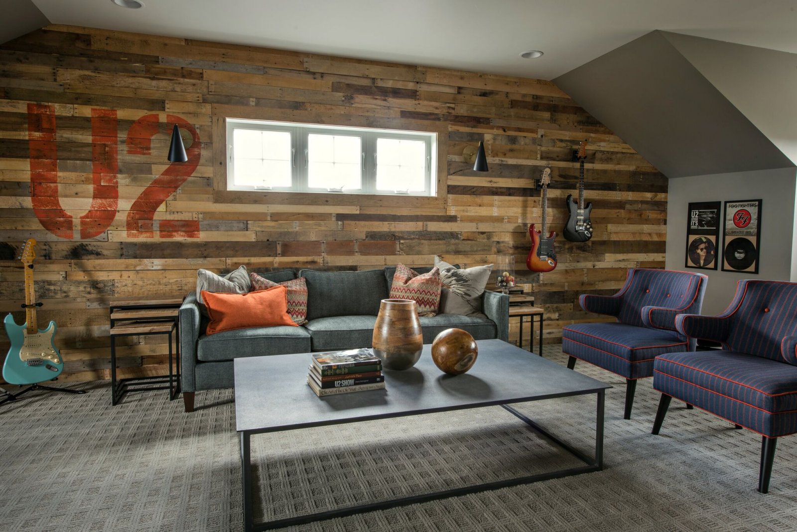 industrial living room with reclaimed wood wall