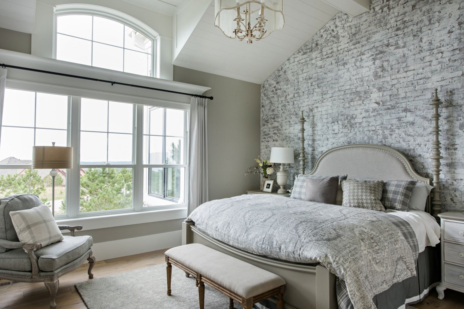 bedroom with white washed brick