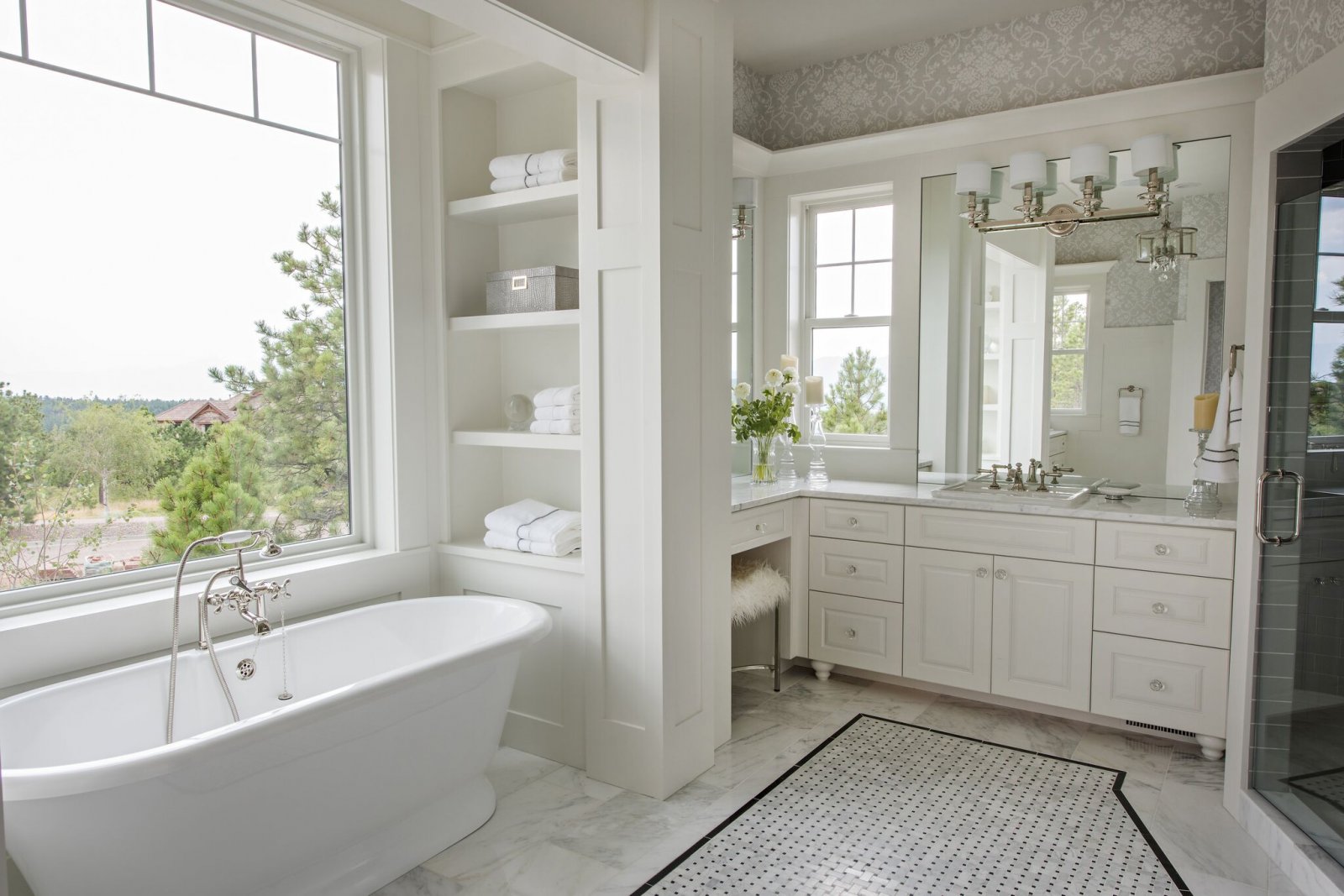 white bathroom with marble and built-in shelf parade of homes