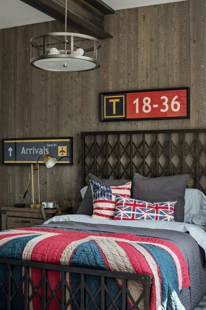 industrial boys bedroom with reclaimed wood wall