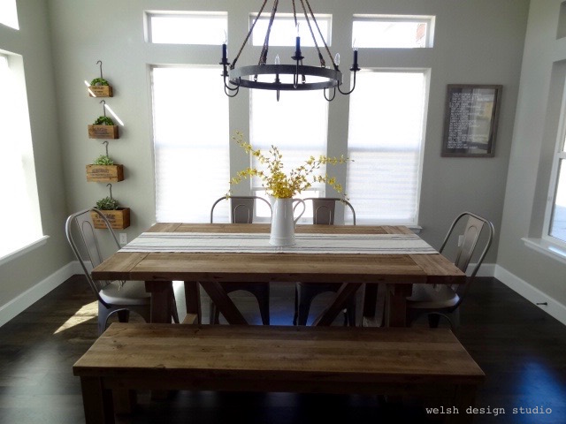 industrial farmhouse dining table with bench and metal chairs