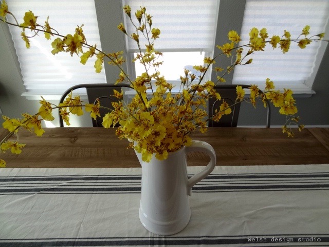 farmhouse flowers in white pitcher