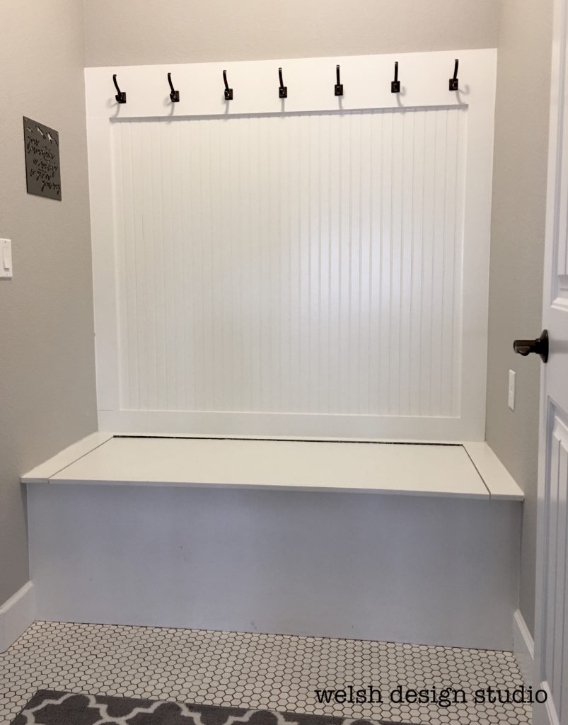 mudroom makeover with hinged bench