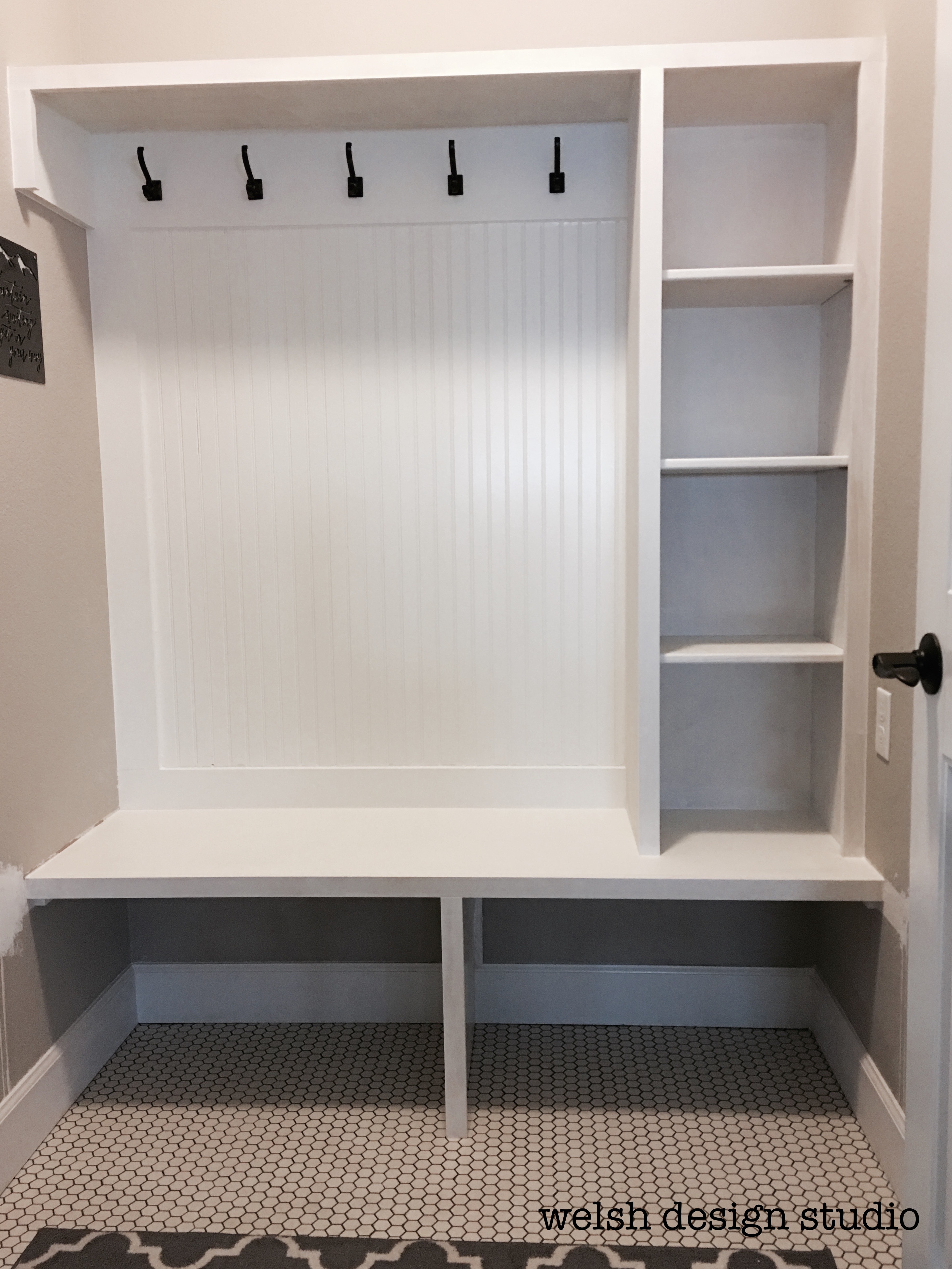 custom mudroom makeover with bench and shelves