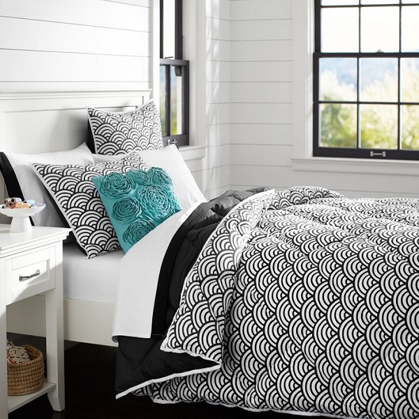 black and white and teal bedroom with shiplap
