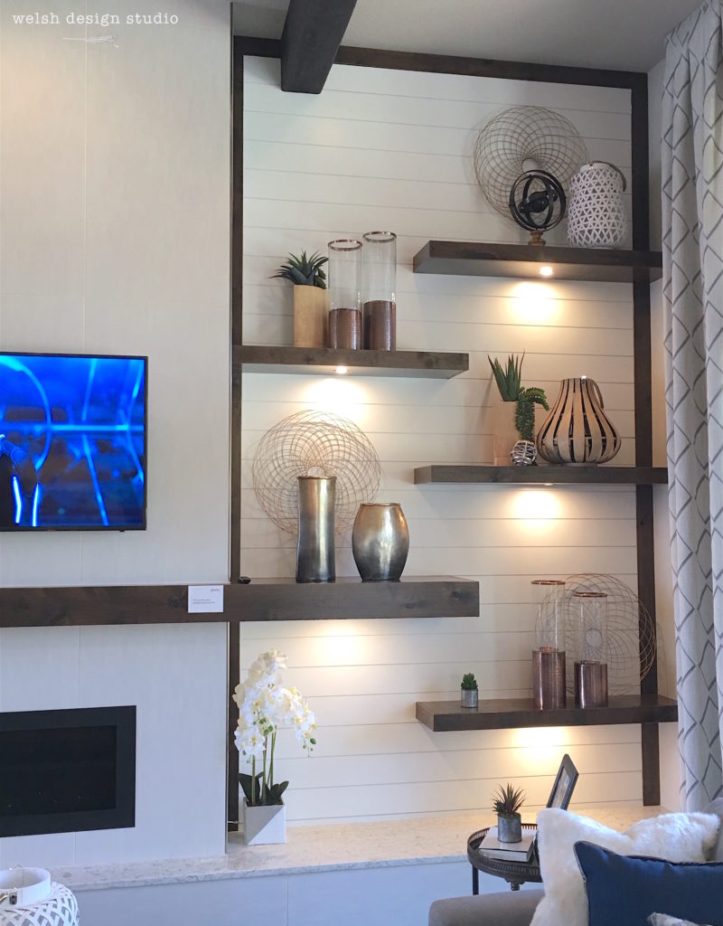 shiplap fireplace with floating shelves