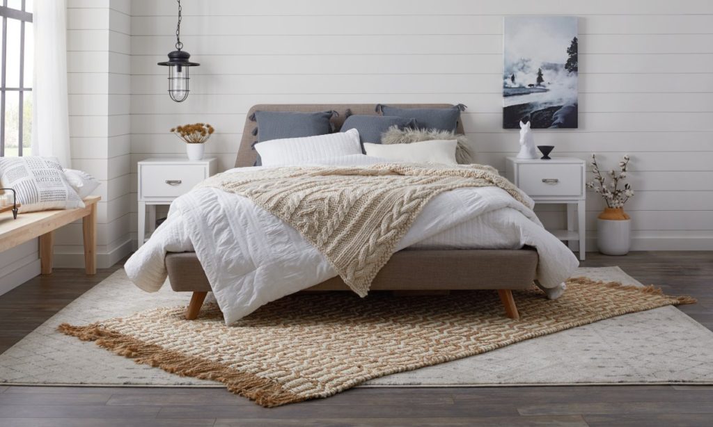make your room more cozy with layered rugs