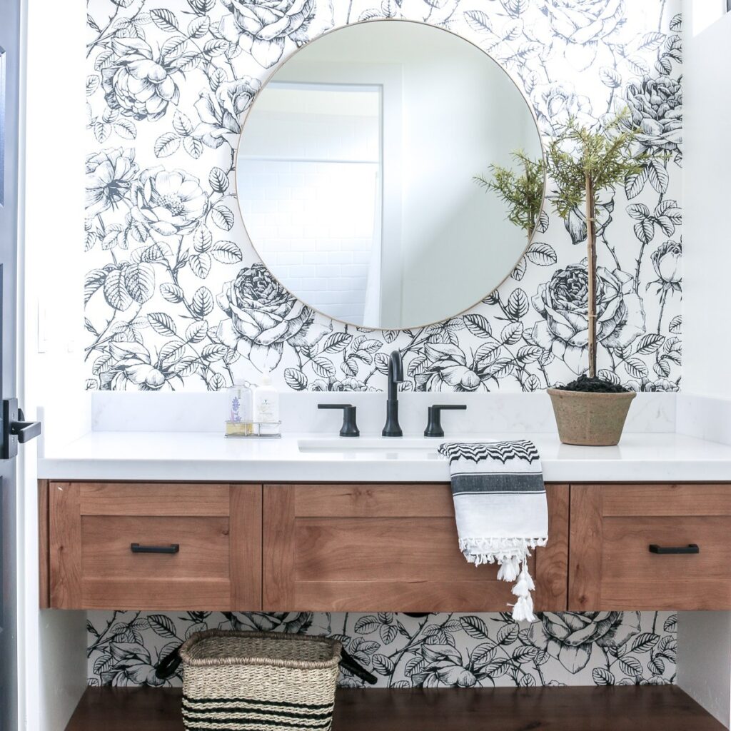 wood floating vanity bathroom with wallpaper