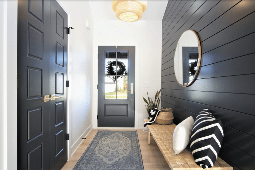 white walls with black doors and accents