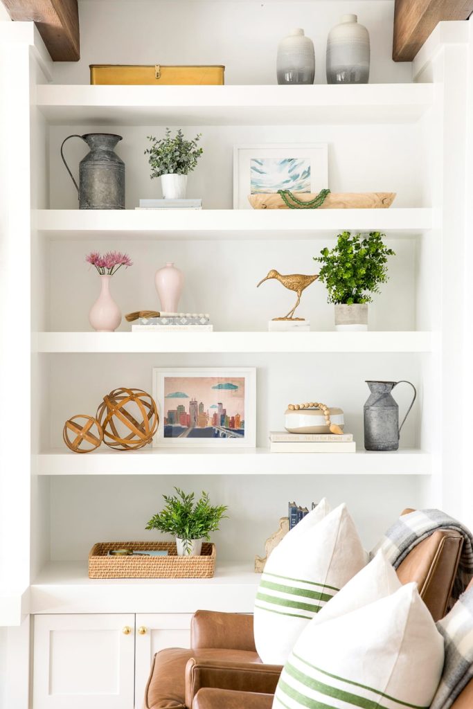 decorating bookshelves with plants