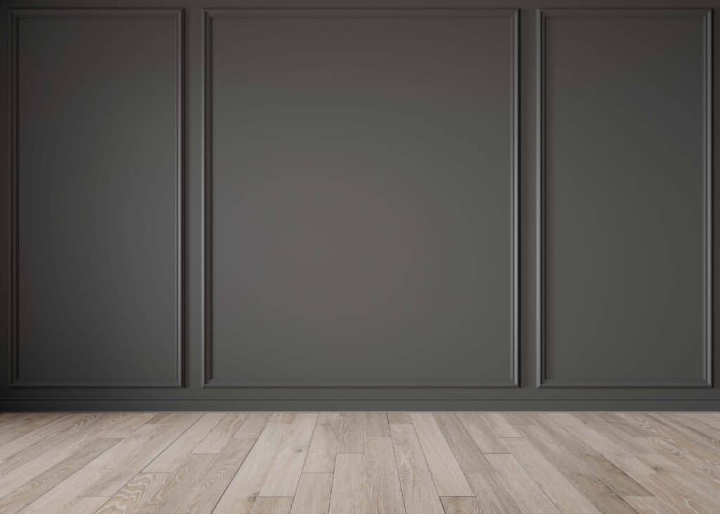 Example of dark wall color with gray floors creating contrast in a room