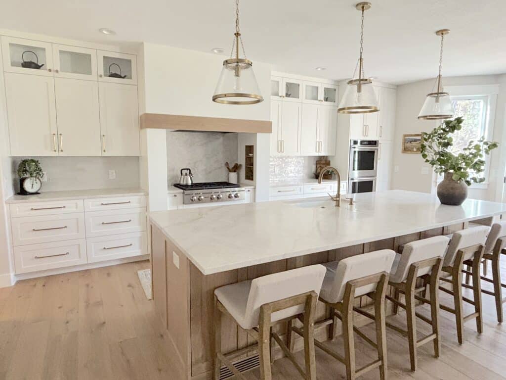 white dove kitchen with white oak island