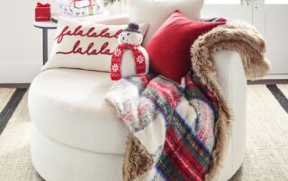 holiday decorating with plaid blanket